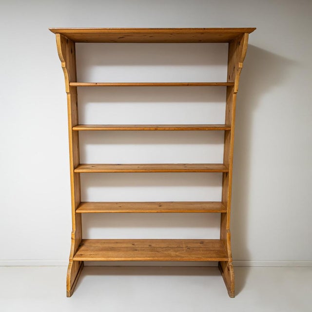 Softwood kitchen shelf with six tiers and decoratively cut side panels. A charming and functional example of 19th-century...