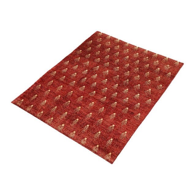 Elevate your interior design projects with this extraordinary 8' x 10' hand-knotted "Shooting Star" transitional rug,...