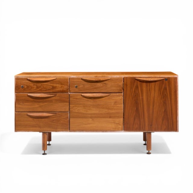 Jens Risom Mid Century Walnut Credenza This credenza measures: 54.25 wide x 20 deep x 26.5 inches high Great Vintage...