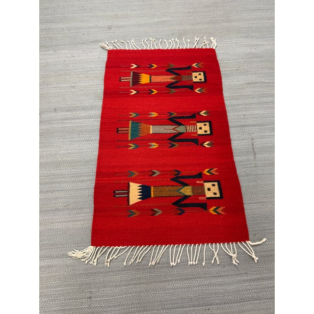 Design Plus Gallery presents the 1ft 11in × 3ft 8in Russet Ancestor Area Rug from the Southwestern Navajo Yei Tribe. The...