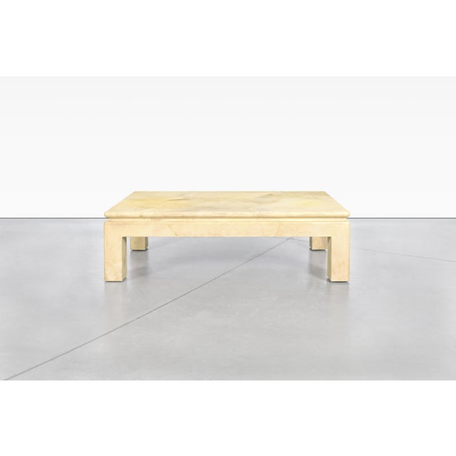 Fabulous vintage leather goatskin coffee table attributed to Karl Springer, circa 1980s. This coffee table has a...