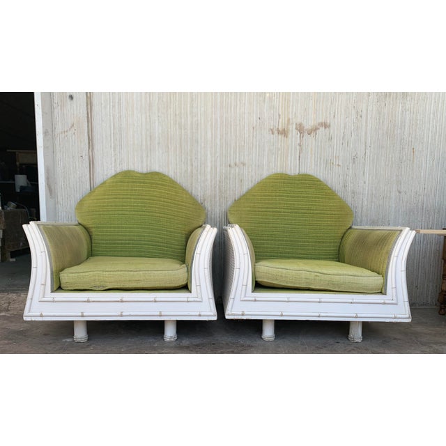 Pair of Hollywood Regency, white lacquer faux bamboo lounge chairs. We will ship the piece perfectly restored I needs a...