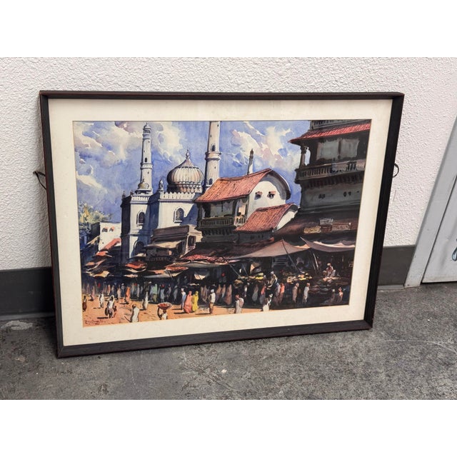 Design Plus Gallery presents a Framed Delhi Mazar Street Scene watercolor by G.D. Thyaga Raj, dated 1968. The composition...
