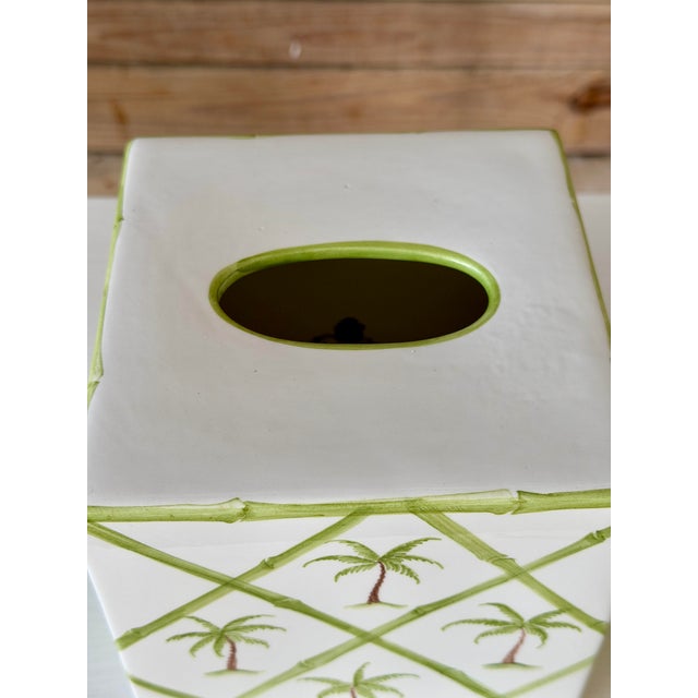 A charming and beautifully made Italian ceramic tissue box by The Mane Lion, featuring a crisp white ground adorned with...
