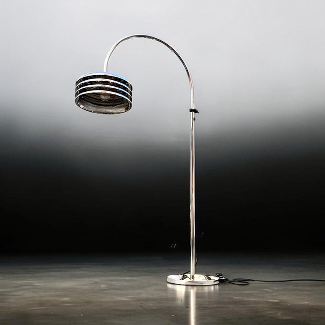 An exceptionally beautiful floor lamp, a heavy-duty arc lamp, absolutely stable, height-adjustable and rotatable. In...