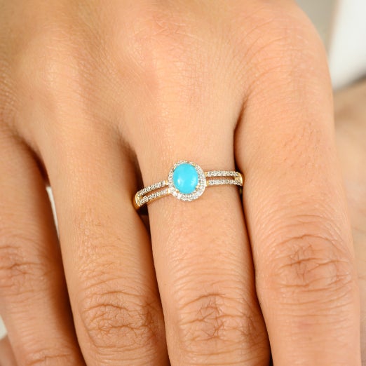 0.37 CTW Natural Turquoise Oval 5x4 mm with Diamond Accents Halo Ring in 14K Yellow Gold featuring natural turquoise of...