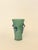 In the spirit of 1980s Italian glass. A vase in satin-finish seafoam green glass adorned with blue glass appliqués forming...