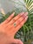 This elegant engagement ring features a 1.09 ct emerald-cut emerald, set in 14K yellow gold. The emerald measuring 7 x 5...