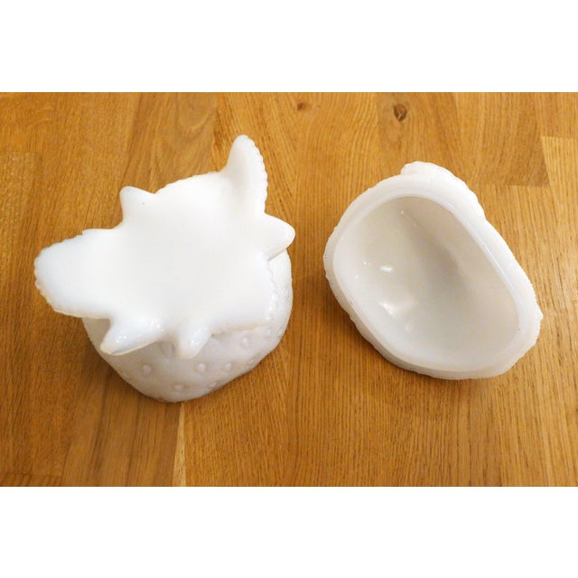 “Strawberry” model sugar bowl, with zoomorphic snail lid grip; in pressed white fairground opaline, available in blue &...