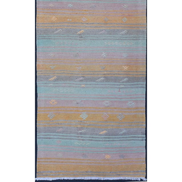 Measures: 2'4 x 10'7 Vintage Turkish Kilim Runner with Blue, Orange, and Soft Lavender Stripes. Keivan Woven Arts /...