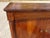 A 19th-century buffet with two doors and one drawer, featuring a curved top. Magnificent marquetry top with chevron and...