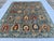 This artistic hand-knotted wool area rug features a vibrant and highly sought-after Suzani design. The main field is...