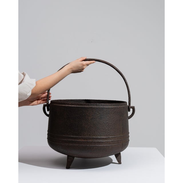 This mid 20th century serving piece from France is finished in charcoal, worked in iron. Its form follows honest, well-...