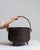 This mid 20th century serving piece from France is finished in charcoal, worked in iron. Its form follows honest, well-...