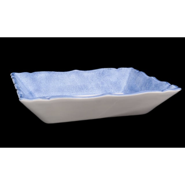 Christian dior – porcelain tray circa 2000 porclain tray decorated with a seashell in shades of blue and mauve. signed on...