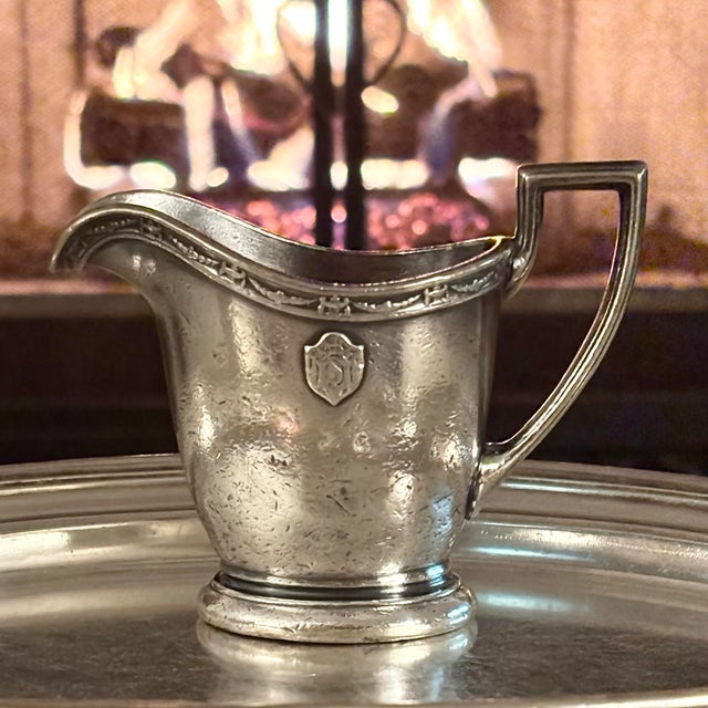 This timeless 3-ounce vintage Hotel Statler creamer by the International Silver Company (pattern 04445) features the...