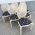 Striking set of six vintage French Provincial dining chairs featuring oversized oval cane backs and beautifully carved...