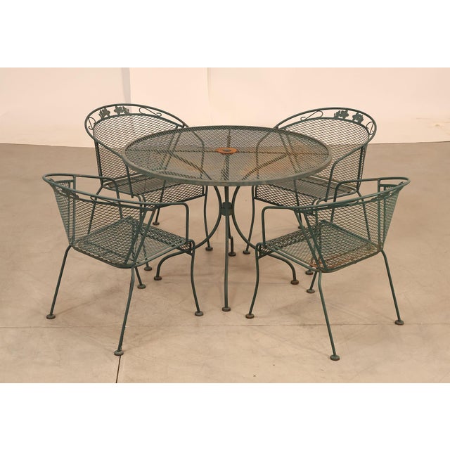High Quality American Made Five Piece Wrought Iron Patio Dining Set Including Round Mesh Table And Four Matching Arm...