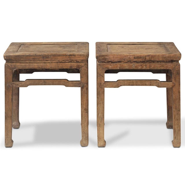 Handcrafted in Beijing circa 1920, these elm stools showcase a beautiful natural wood grain and a smooth sanded finish....