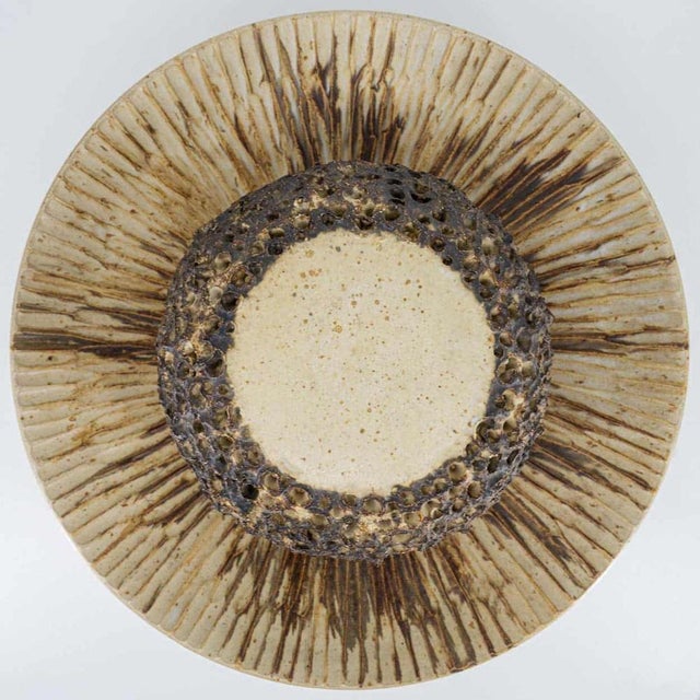 Spectacular circular ceramic wall light, with beautiful accents. Manufactured in denmark in the 1970s. In excellent...