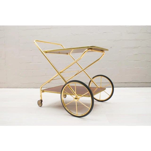 Vintage Hollywood Regency Gold-Colored Mahogany Trolley, 1960s, in Very Good conditions. Designed 1960 to 1969