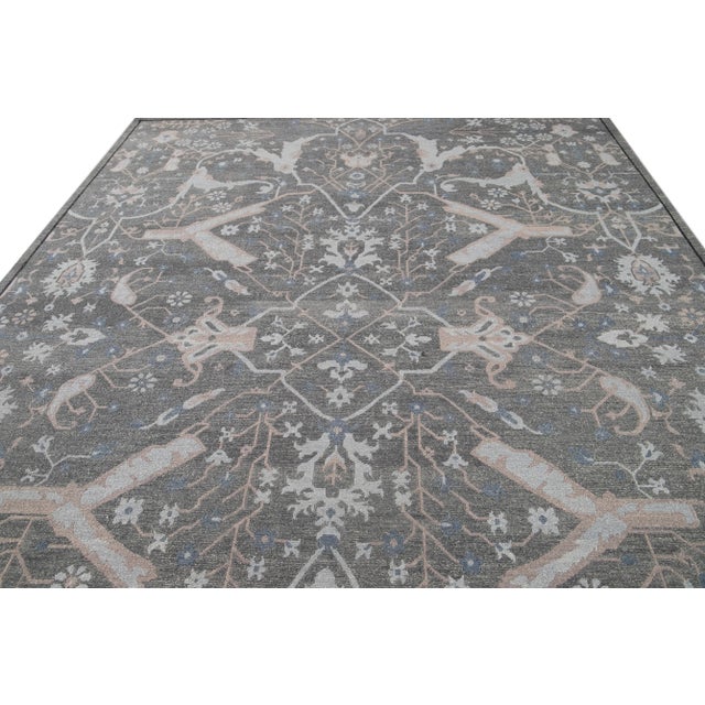 Make a statement with our oversize Soumak rug. Handmade with wool, it boasts a beautiful gray field and an all-over design...