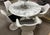 Here I'm offering not just THE beautiful Knoll table, but a complete set of chairs: Eero Saarinen created an imposing yet...