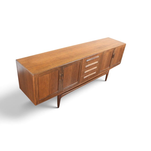 This large credenza is from G Plan's Fresco range, designed by Victor B. Wilkins and produced in England during the 1960s....