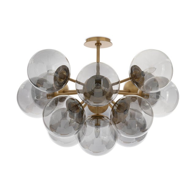 The Shine Flush Mount epitomizes contemporary sophistication with a touch of mid-century modern influence. The fixture...