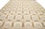This flatweave rug features a chic contemporary Dhurrie design with a tan field color. It has a geometric pattern...