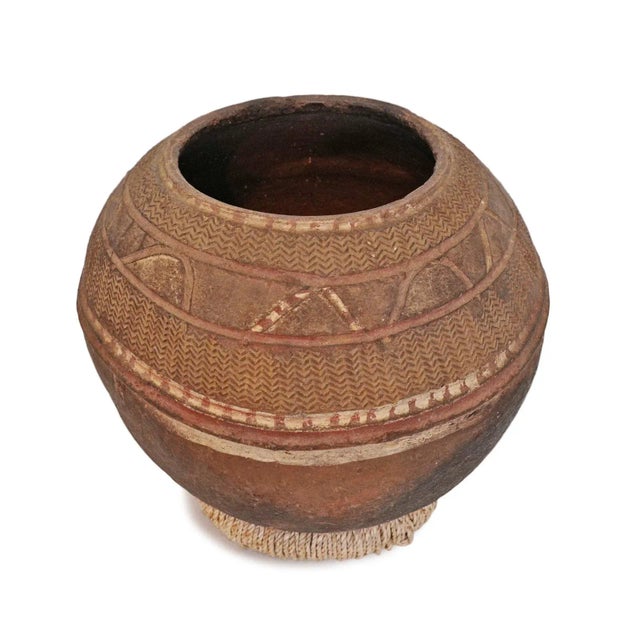 Beautiful vintage Bida water vessel. Hand crafted old terra cotta water storage pot with hand carved design patterns. Each...