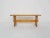 In the style of Rainer Daumiller or Ate van Apeldoon, pine wood bench for at the dining table or in the hall way.