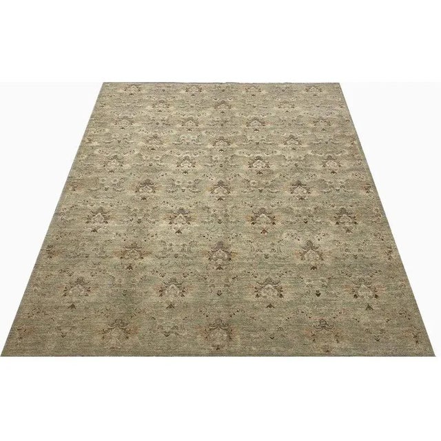 ACTUAL SIZE: 5’7″ x 7’9″ PRIMARY COLOR: Green AGE: New ORIGIN: Pakistan MATERIALS: Wool FOUNDATION: Cotton PRODUCTION:...