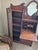 This is an antique American Late Victorian "side-by-side" unit, combining a secretary desk, bookcase, and vanity mirror...