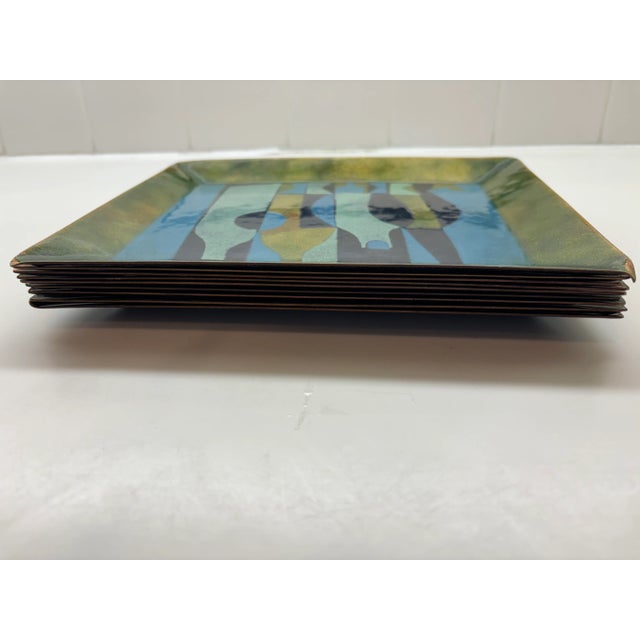 Nine mid-century enamel catchall trays. two of four designs, and one single design (see group photo). Beautiful, vibrant...