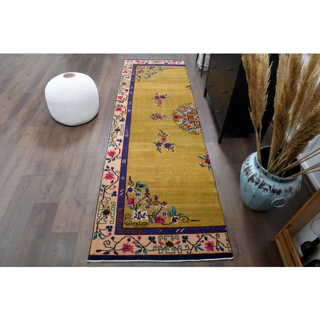 Vintage Persian Hand-Knotted runner rug is a semi-antique vintage runner rug. The '70s Eastern region of Anatolian's...