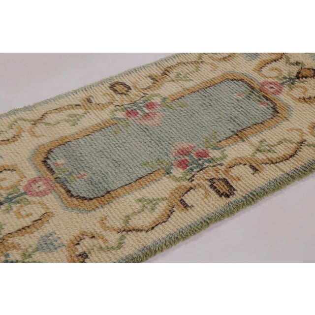 Hand-knotted in high-pile wool in Sweden circa 1960-1970, this 4x5 vintage Swedish Rya rug is a bold new addition to Rug &...