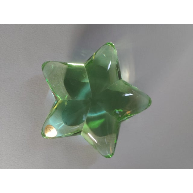 The green color is most beautiful. This object will look well among other collected pieces. It will sit well among a...