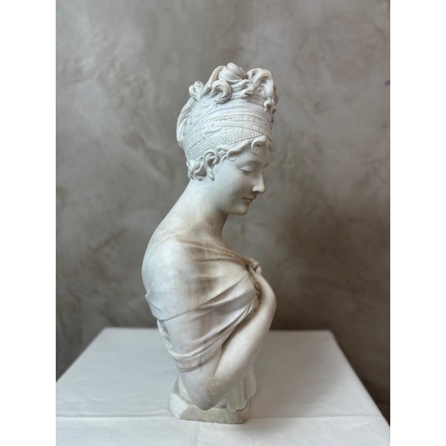 Superb Carrara marble bust of Juliette Récamier, a celebrated figure in early 19th-century Lyon and Parisian society. This...