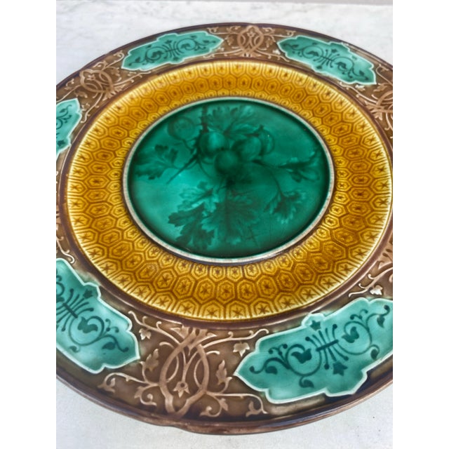 Majolica gooseberry plate signed Sarreguemines Majolica, circa 1870. Geometric pattern on the border.