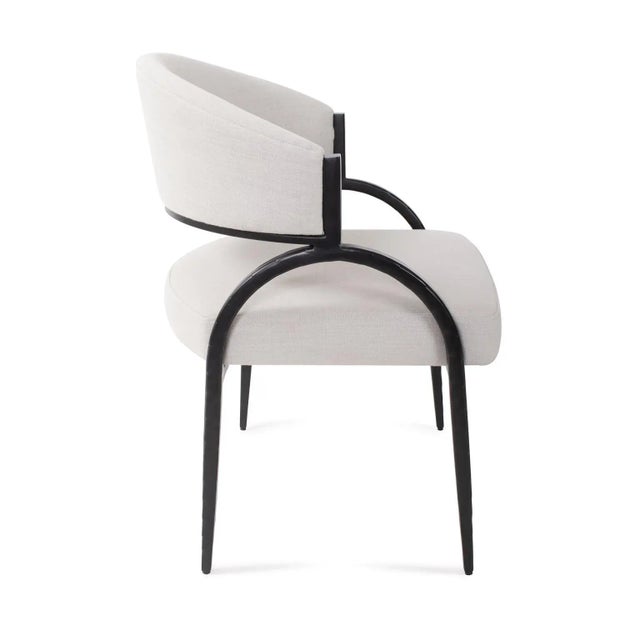The Dewitt Upholstered Side Chair This piece effortlessly blends comfort and style, with its plush smokey grey upholstery...
