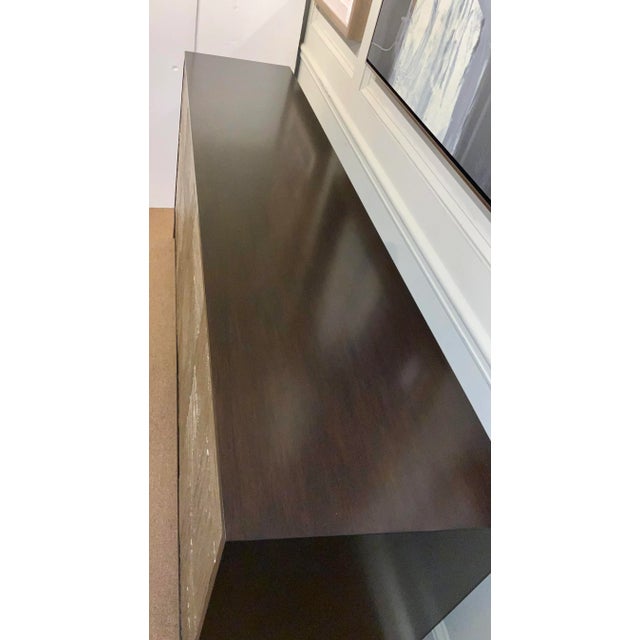 Original Retail $6800, stylish John Richard Modern Warm Silver Meta Credenza, dark brown wood body with textured warm...