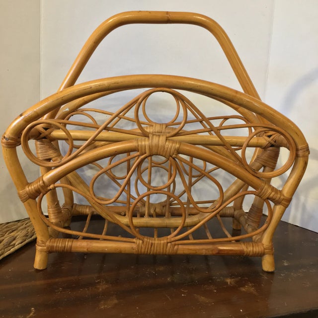 Great bent bamboo/rattan mid-century magazine rack. Attractive storage option for any room. Love the scrolled/circular...