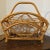 Great bent bamboo/rattan mid-century magazine rack. Attractive storage option for any room. Love the scrolled/circular...