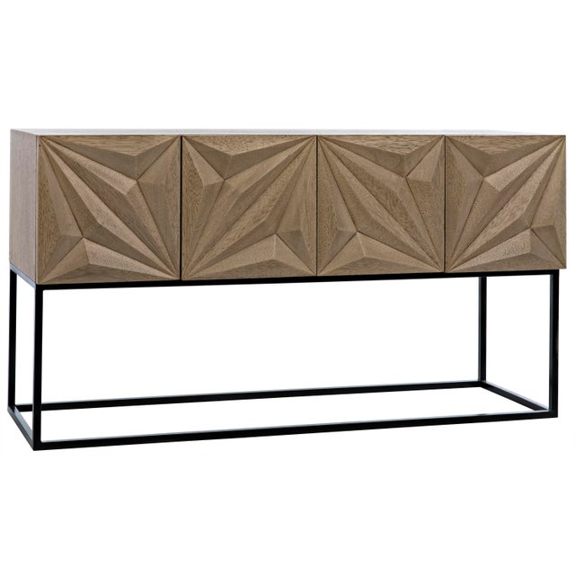 Stunning in its simplicity, this solid walnut sideboard rests atop slim metal legs. Each of its four doors is beautifully...