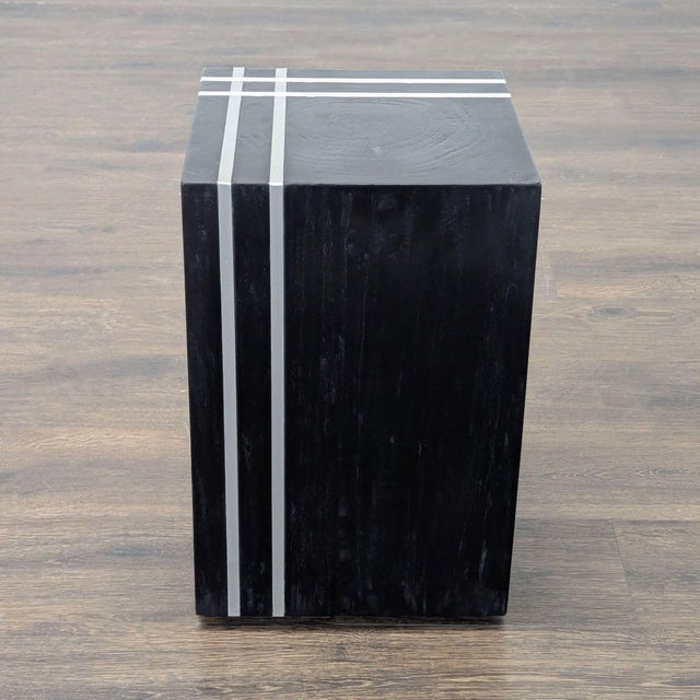Wood stool with stainless steel inserts. Brand: Four Hands. Original Price: $425. Dimensions (in): 12W x 12D x 19H.