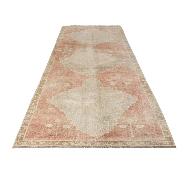 Vintage handknotted decorative wool rug from Kars region of Turkey. Approximately 50-60 years old. In very good condition.