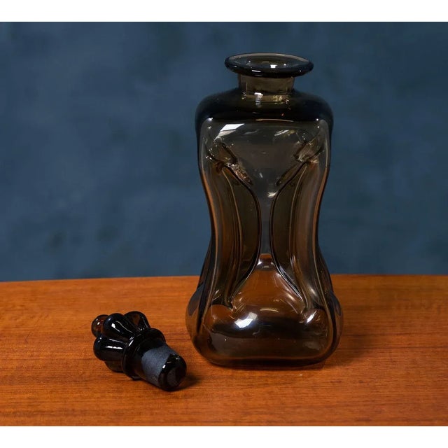 Mid century danish glass 'kluk kluk' decanter designed by jacob e. Bang for holmegaard. A fine 1950s danish smoked/grey...