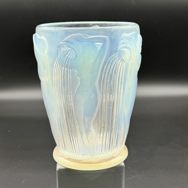 Danaïdes Vase in Opalescent Glass by R. Lalique, 1926, in Flawless conditions. Designed 1920 to 1949 This piece has an...