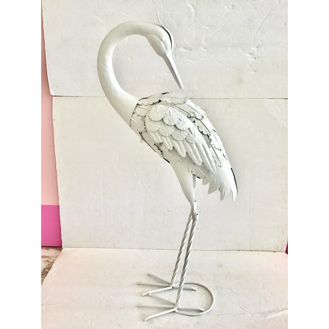 Beautiful boho chic small metal stork grooming itself freshly lacquered in white. Great addition to your Palm Beach and...